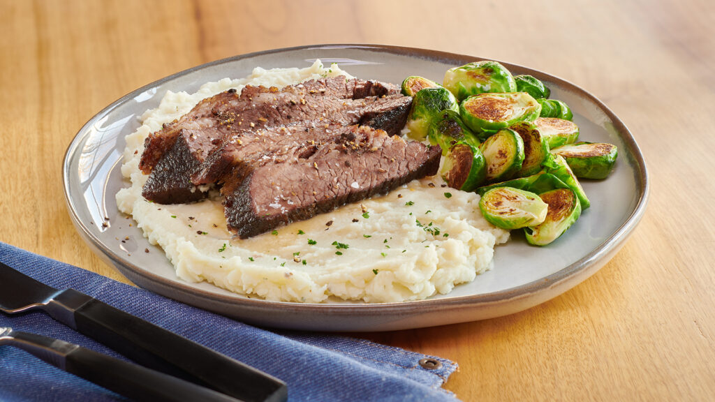 Butter & Herb Mashed Potatoes with Corned Beef Brisket and Roasted Brussels Sprouts by Idahoan
